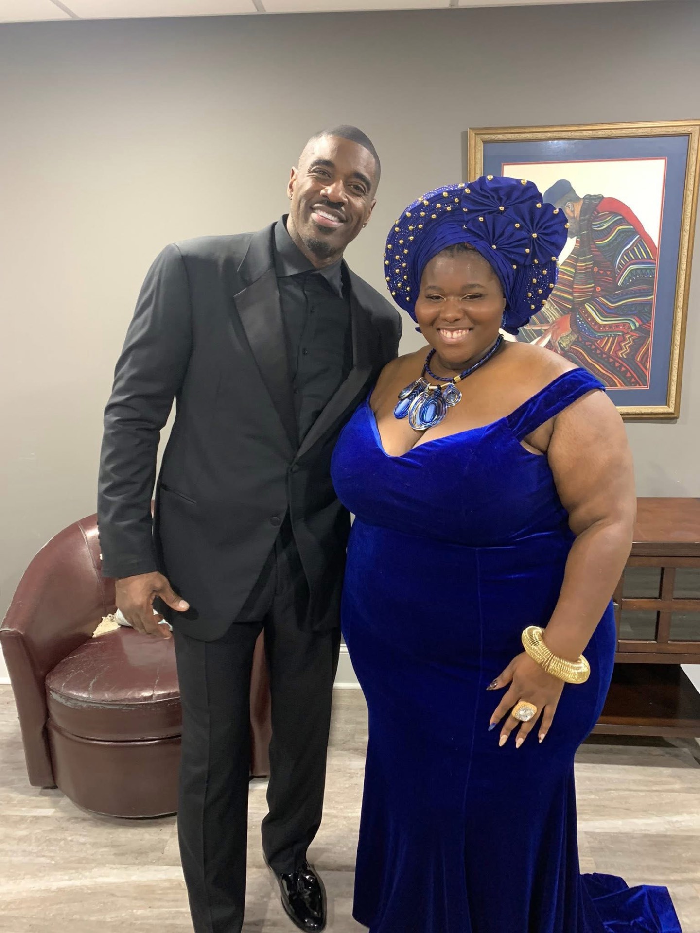 Anukkah in a royal blue gown at a gala